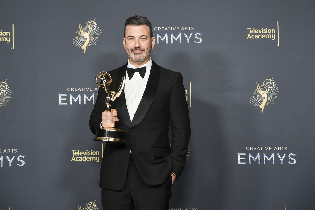 Jimmy Kimmel poses in the press room with the award for host for a game show for "Who Wants to Be a Millionaire" during night two of the Creative Arts Emmy Awards on Sunday, Sept. 7, 2025, at the Peacock Theater in Los Angeles. (Photo by Richard Shotwell/Invision/AP)
