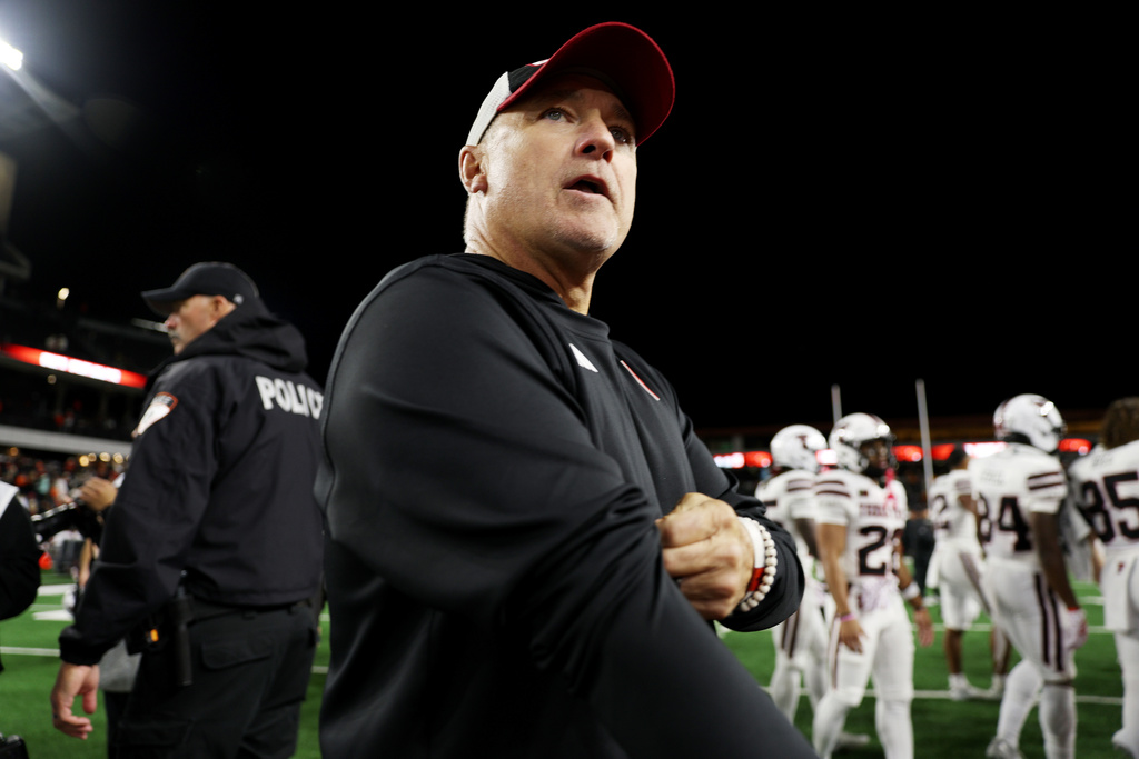 Texas Tech head coach Joey McGuire walks off the field after the second half of an NCAA college football game, Saturday, Sept. 12, 2026, in Corvallis, Ore. (AP Photo/Lydia Ely)