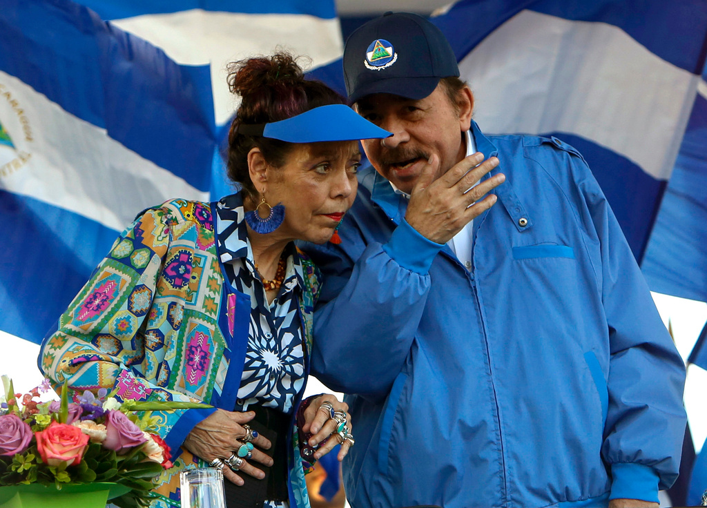 FILE - Nicaragua's President Daniel Ortega and his wife and Vice President Rosario Murillo lead a rally in Managua, Sept. 5, 2018. (AP Photo/Alfredo Zuniga, File)