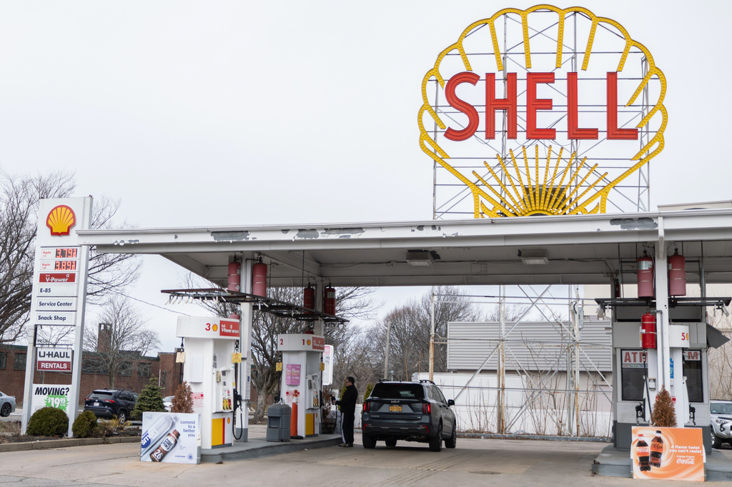 A man pumps gas Sunday, March 15, 2026, in Cambridge, Mass. (Zoe Beketova/MIT Graduate Program in Science Writing via AP)