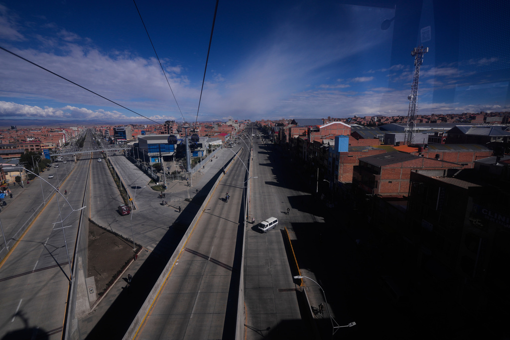 FILE - Highways are free of traffic due to Aymara farmers blocking the roads during an anti-government protest in El Alto, Bolivia, May 13, 2026. (AP Photo/Juan Karita, File)