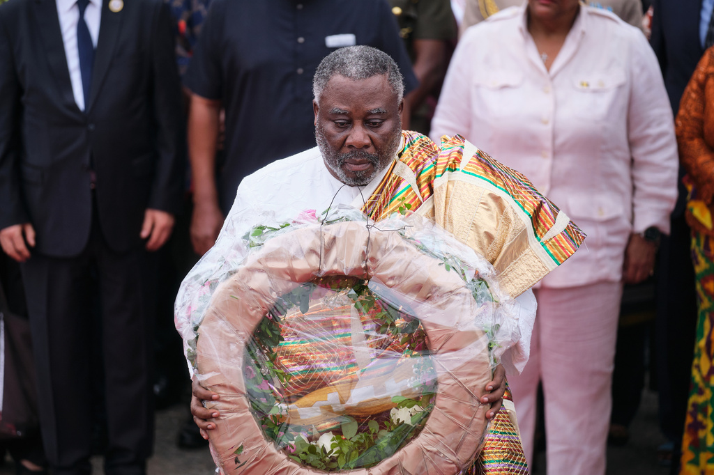 Ogyeahoho Yaw Gyebi II, Paramount Chief of the Sefwi Anhwiaso Traditional Area and President of the National House of Chiefs, lays a wreath in a ceremony to honor victims of the transatlantic slave trade at Christiansborg Castle during a Juneteenth commemoration ceremony in Accra, Ghana, Friday, June 19, 2026. (AP Photo/Reuben Ekow Quansah)