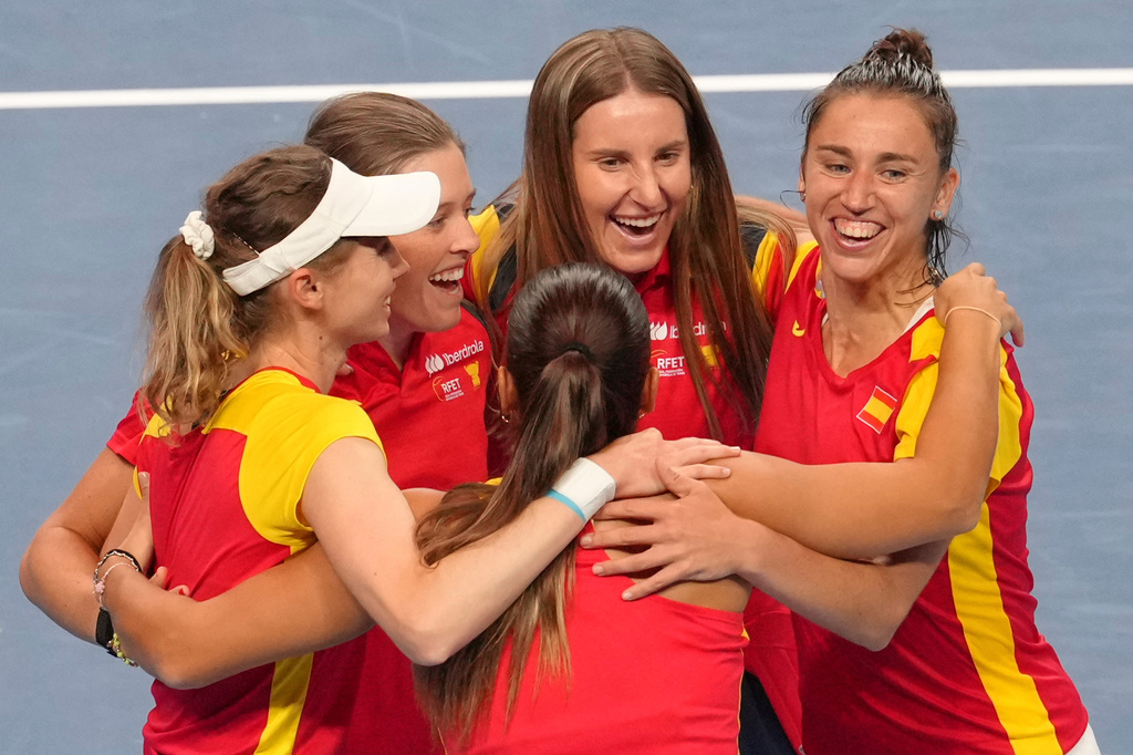 Spain's team members celebrate after defeating Kazakhstan in a quarterfinal match for the Billie Jean King Cup held in Shenzhen in southern China's Guangdong province, Wednesday, Sept. 23, 2026. (AP Photo/Andy Wong)