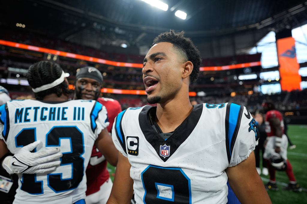 Carolina Panthers quarterback Bryce Young (9) walks off the field after an NFL football game against the Atlanta Falcons in Atlanta, Sunday, Sept. 20, 2026. (AP Photo/Mike Stewart)
