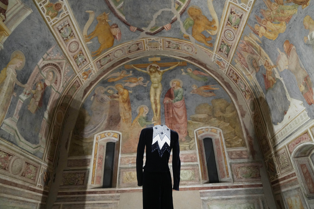 Giorgio Armani's creations are displayed during the exhibition "Giorgio Armani - 50 Years" opened to the public at the Pinacoteca di Brera in Milan, Italy, Wednesday, Sept. 24 2025. (AP Photo/Antonio Calanni)