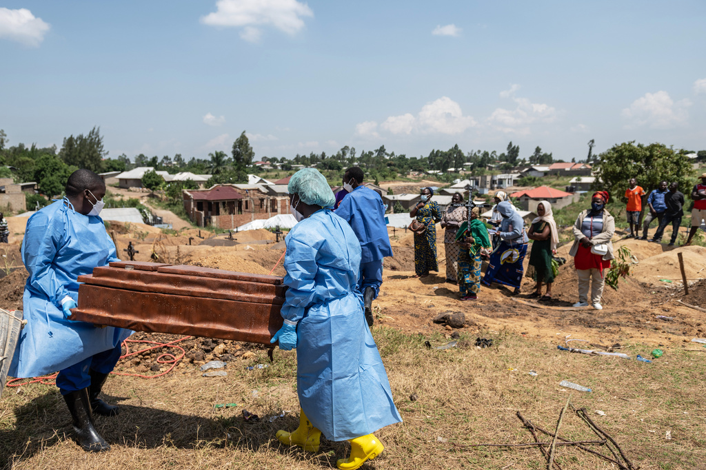 Red Cross workers prepare to bury Vanisa Anifa, a 6-month-old orphaned girl who died of Ebola, at the Bigo Cemetery, in Bunia, Congo, Friday, June 19, 2026. (AP Photo/Moses Sawasawa)