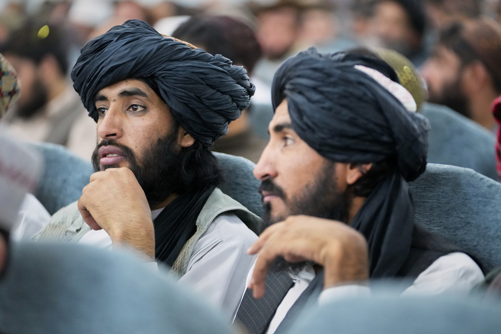 Taliban delegates from across the country gather during a meeting that opens celebrations marking the fifth anniversary of the U.S. withdrawal and the start of Taliban rule, at the Loya Jirga Hall in Kabul, Afghanistan, Saturday, Aug. 15, 2026. (AP Photo/Siddiqullah Alizai)