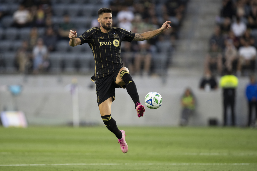 FILE - Los Angeles FC forward Olivier Giroud controls the ball during the second half of an MLS soccer match against the Vancouver Whitecaps in Los Angeles, June 29, 2025. (AP Photo/Kyusung Gong, file)