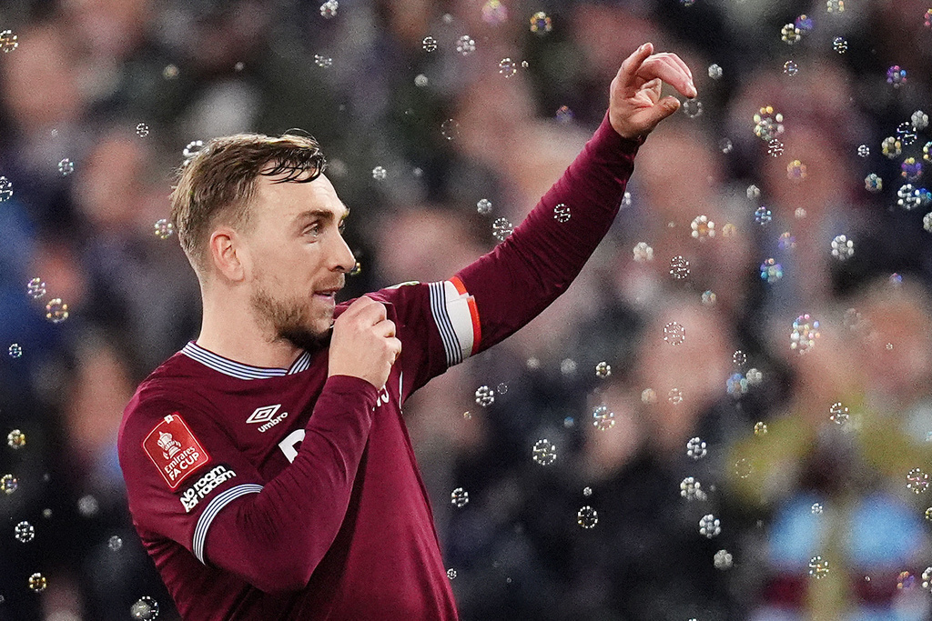 West Ham United's Jarrod Bowen celebrates scoring during the English FA Cup fifth round soccer match between West Ham United and Brentford in London, Monday March 9, 2026. (Ben Whitely/PA via AP)