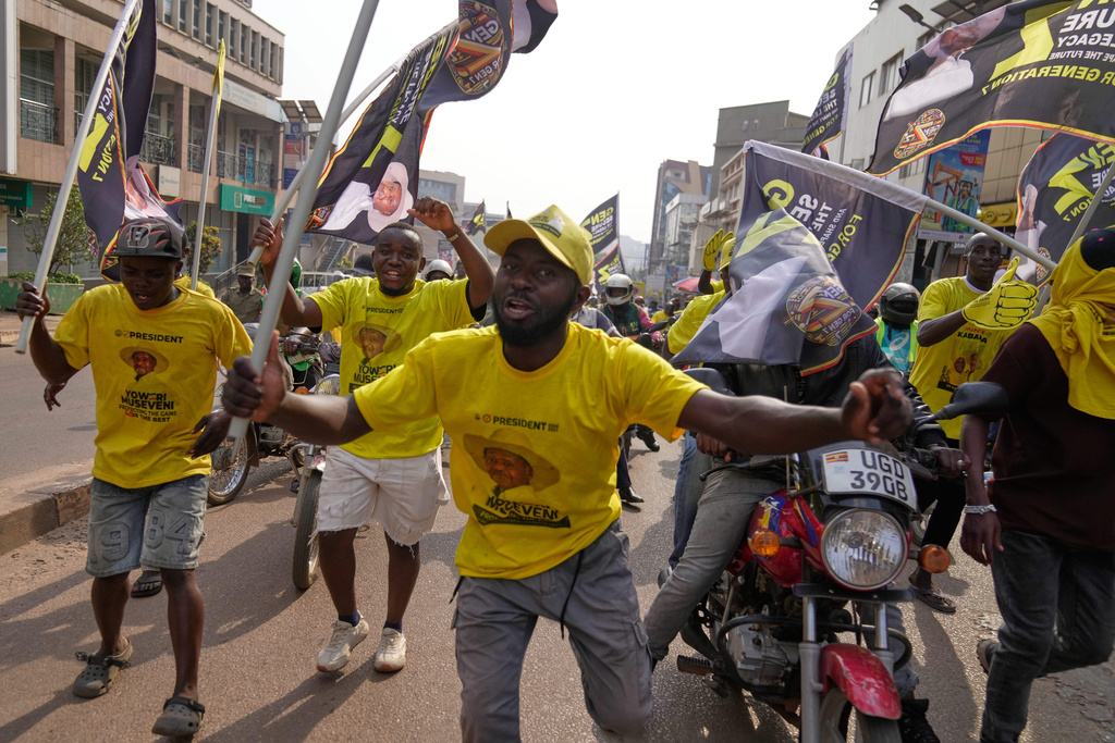 Supporters of Ugandan President Yoweri Museveni celebrate his victory in the presidential election in Kampala, Uganda, Saturday, Jan. 17, 2026. (AP Photo/Brian Inganga)