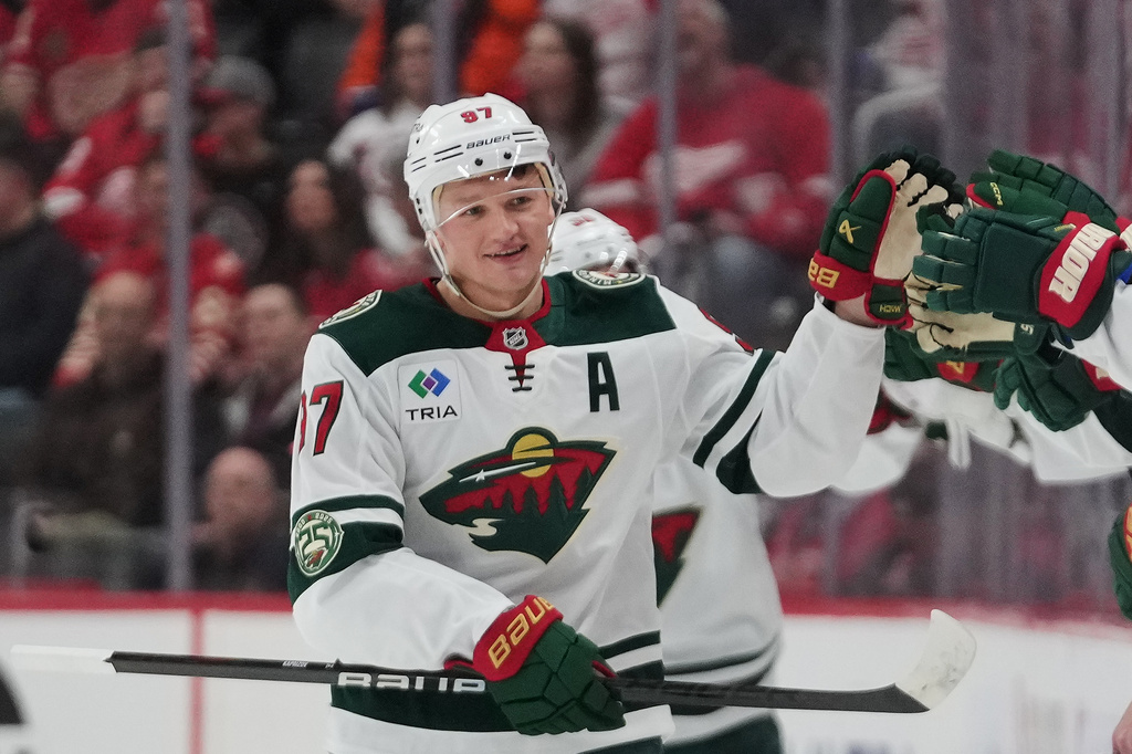 Minnesota Wild left wing Kirill Kaprizov celebrates his goal against the Detroit Red Wings in the second period of an NHL hockey game Sunday, April 5, 2026, in Detroit. (AP Photo/Paul Sancya)