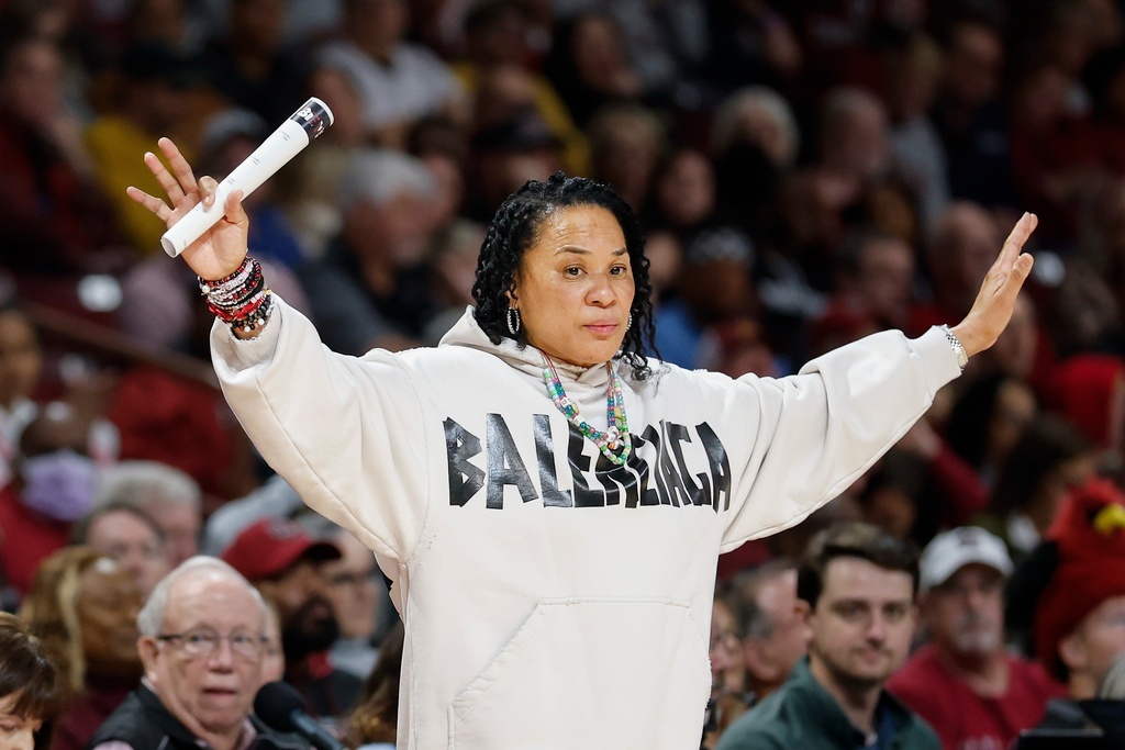 South Carolina head coach Dawn Staley directs her team during the second half of an NCAA college basketball game against Providence in Columbia, S.C., Sunday, Dec. 28, 2025. (AP Photo/Nell Redmond)