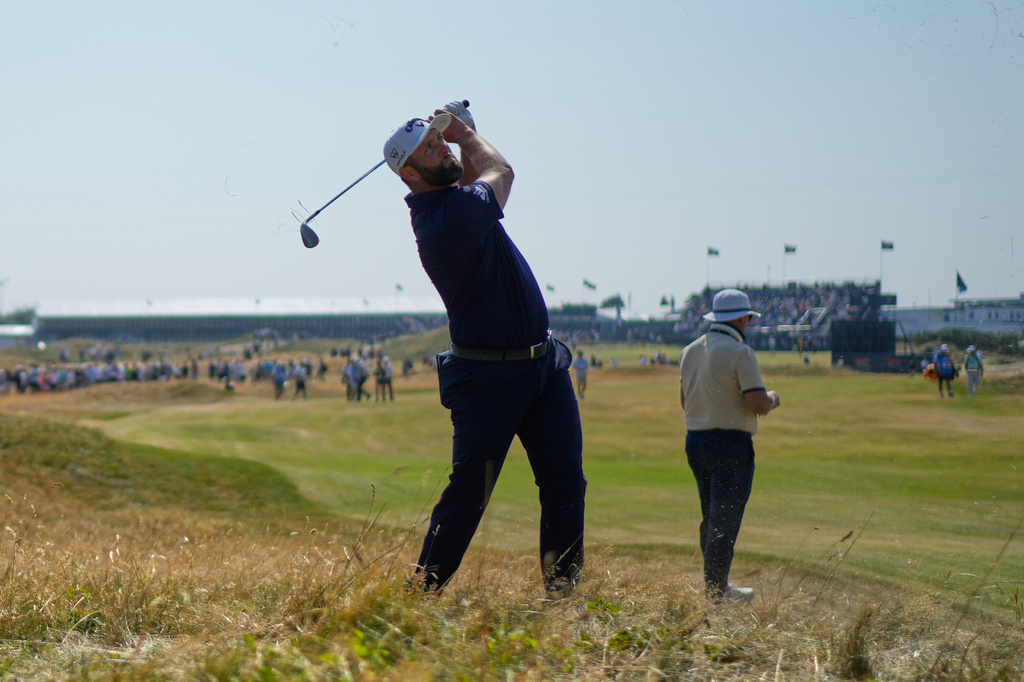 Jon Rahm of Spain plays out of the rough on the 10th fairway during a practice round for the British Open Golf championships at Royal Birkdale golf club, in Southport, England, Wednesday, July 15, 2026. (AP Photo/David Goldman)