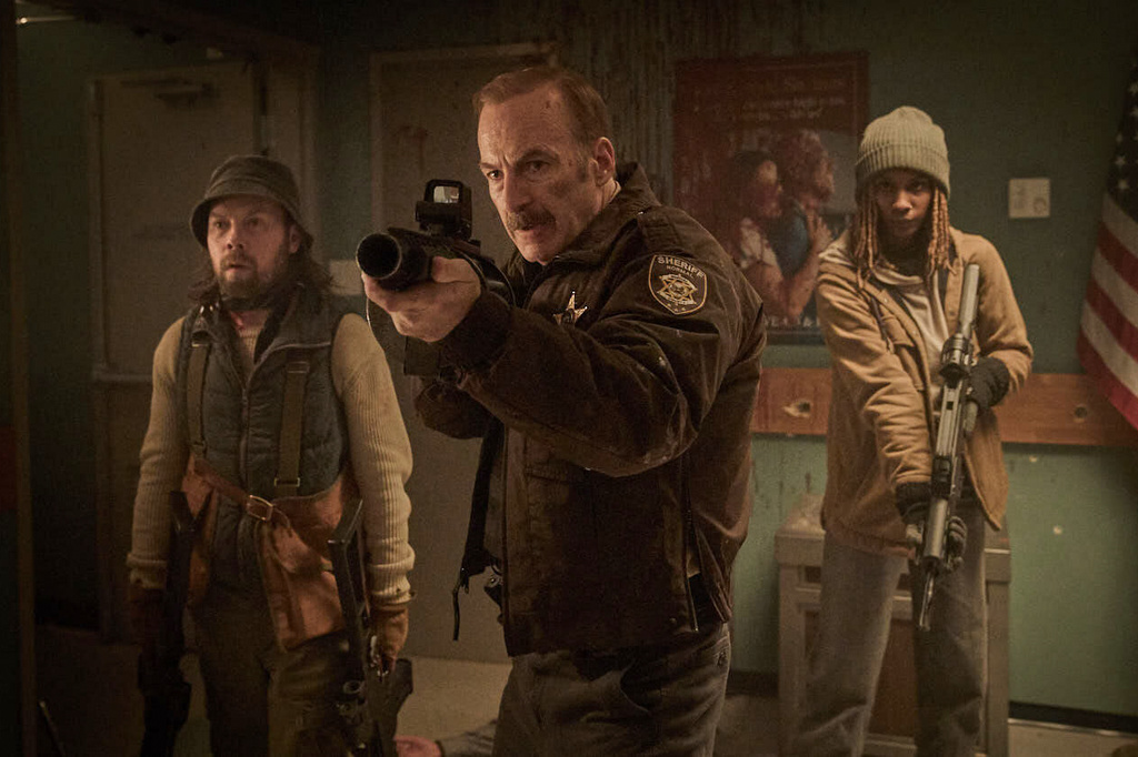 This image released by Magnolia Pictures shows Brendan Fletcher, from left, Bob Odenkirk and Reena Jolly in a scene from "Normal." (Magnolia Pictures via AP)