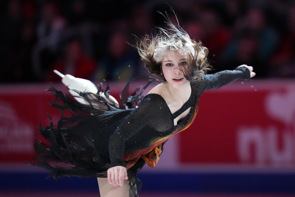 Alysa Liu skates during the "Making Team USA" performance at the U.S. Figure Skating Championships, Sunday, Jan. 11, 2026, in St. Louis. (AP Photo/Stephanie Scarbrough)