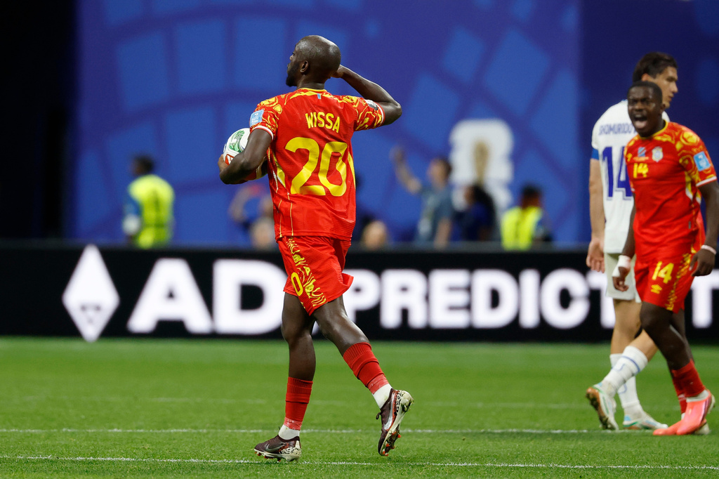Congo's Yoane Wissa (20) celebrates their first goal on a penalty kick during the World Cup Group K soccer match between DR Congo and Uzbekistan in Atlanta, Saturday, June 27, 2026. (AP Photo/Erik S. Lesser)