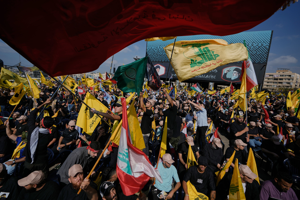 Hezbollah supporters gather to mark the first anniversary of the assassination of Hezbollah leader Sayyed Hassan Nasrallah, who was killed in Israeli airstrikes, at Nasrallah's grave in Beirut, Lebanon, Saturday, Sept. 27, 2025. (AP Photo/Bilal Hussein)