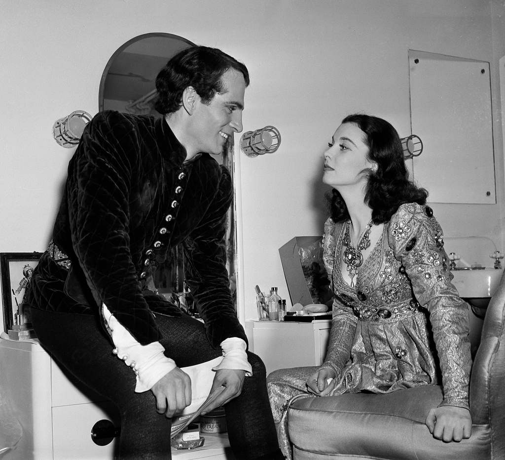 FILE - Laurence Olivier, left, and Vivien Leigh are seen backstage at the 51st Street Theater on Broadway after their opening performance in Shakespeare's "Romeo and Juliet," May 9, 1940, in New York. (AP Photo/Anthony Camerano, File)