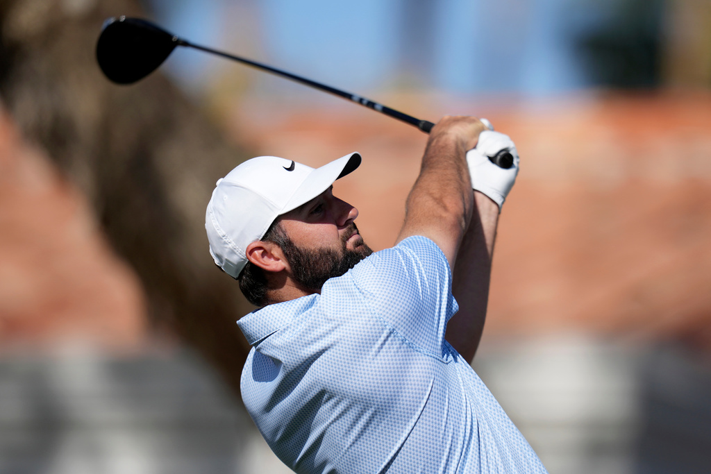 Scottie Scheffler hits his tee shot at the fifth hole during the final round of the American Express golf event on the Pete Dye Stadium Course at PGA West Sunday, Jan. 25, 2026, in La Quinta, Calif. (AP Photo/Ross D. Franklin)