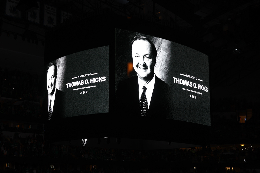 A scoreboard graphic is shown recognizing former Dallas Stars owner Tom Hicks prior to an NHL game against the Pittsburgh Penguins Sunday, Dec. 7, 2025, in Dallas. (AP Photo/Sam Hodde)