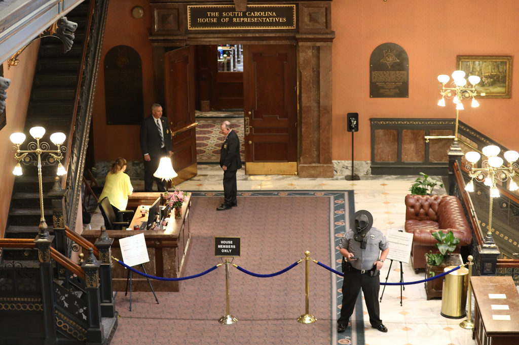 The South Carolina House chamber is roped off as authorities put in extra security during debate on a redistricting bill on Friday, May 15, 2026, in Columbia, S.C. (AP Photo/Jeffrey Collins).