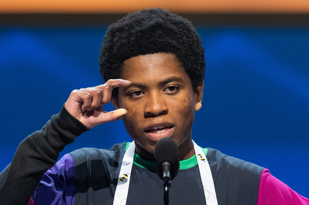 Zwe Spacetime, 14, of Fort Washington, Md., competes during the quarterfinals of the Scripps National Spelling Bee, Wednesday, May 27, 2026, in Washington. (AP Photo/Allison Robbert)
