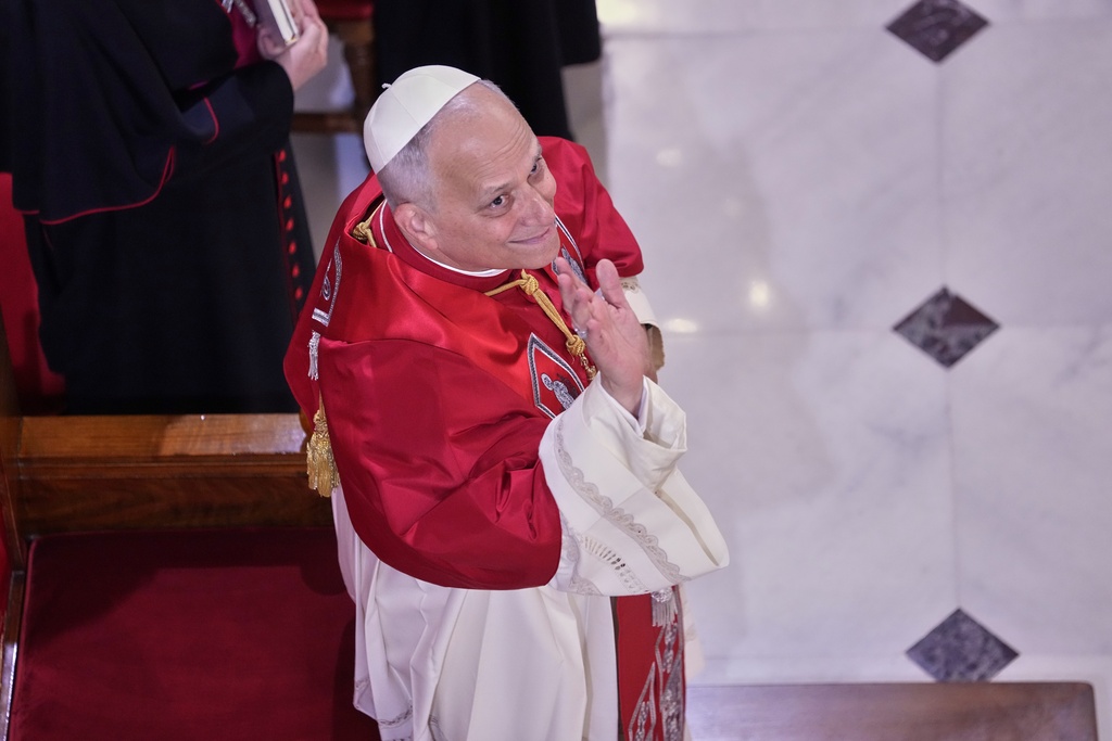 Pope Leo XIV meets the clergy at the Cathedral of the Holy Spirit, in Istanbul, Turkey, Friday, Nov. 28, 2025. (AP Photo/Domenico Stinellis)