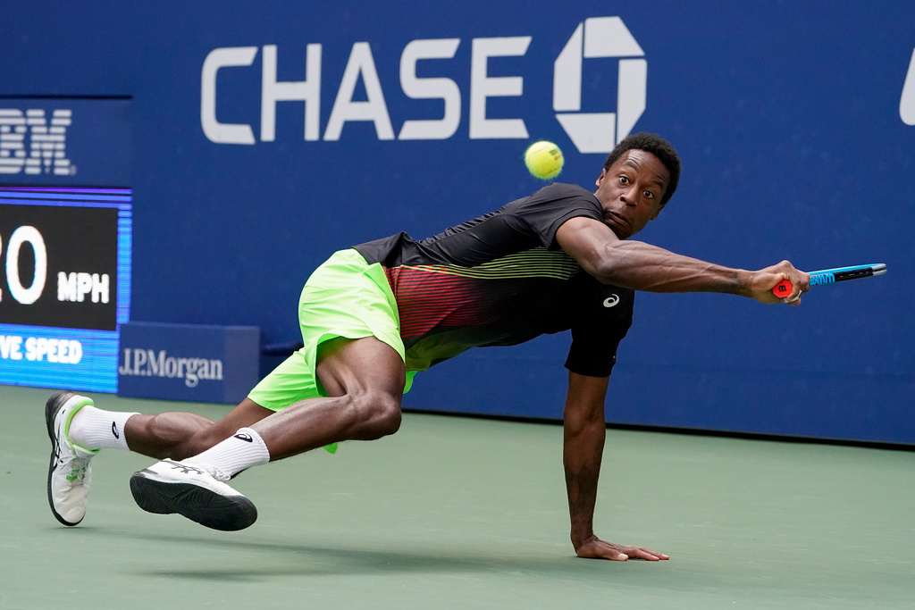 FILE - Gael Monfils, of France, returns a shot to Steve Johnson, of the United States, during the second round of the US Open tennis championships, Thursday, Sept. 2, 2021, in New York. (AP Photo/John Minchillo, File)