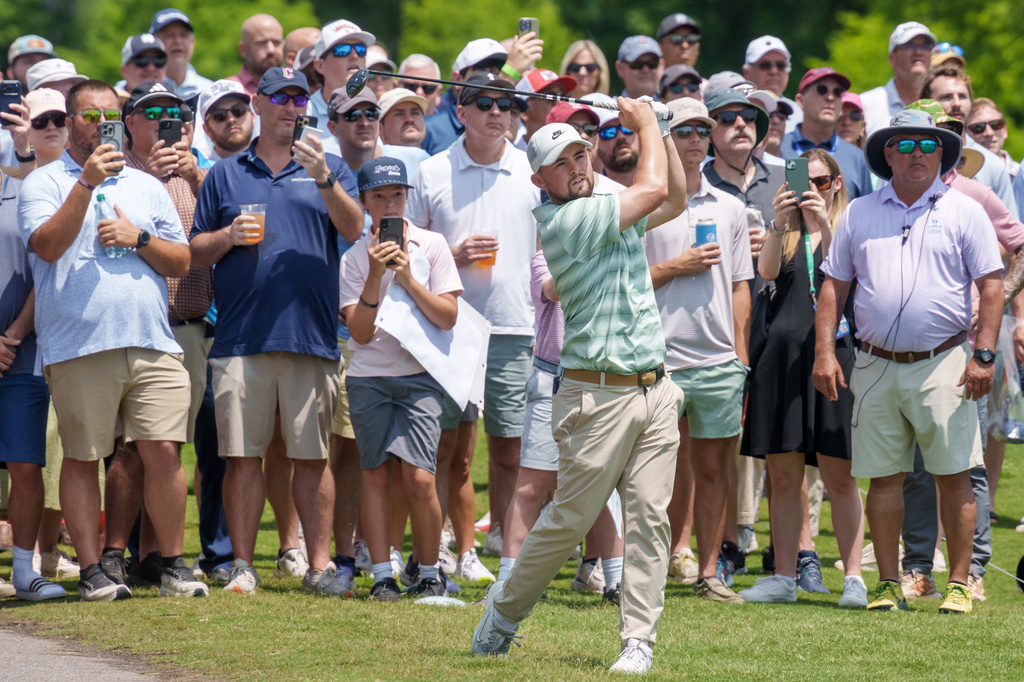 Alex Fitzpatrick, of England, hits a second shot on the second hole during the final round of the PGA Zurich Classic of New Orleans golf tournament, Sunday, April 26, 2026, in Avondale, La. (AP Photo/Matthew Hinton)