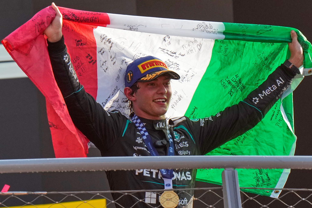 FILE - Mercedes driver Andrea Kimi Antonelli, of Italy, celebrates on the podium after winning the Italian Formula One Grand Prix race in Monza, Italy, Sept. 6, 2026. (AP Photo/Luca Bruno, File)