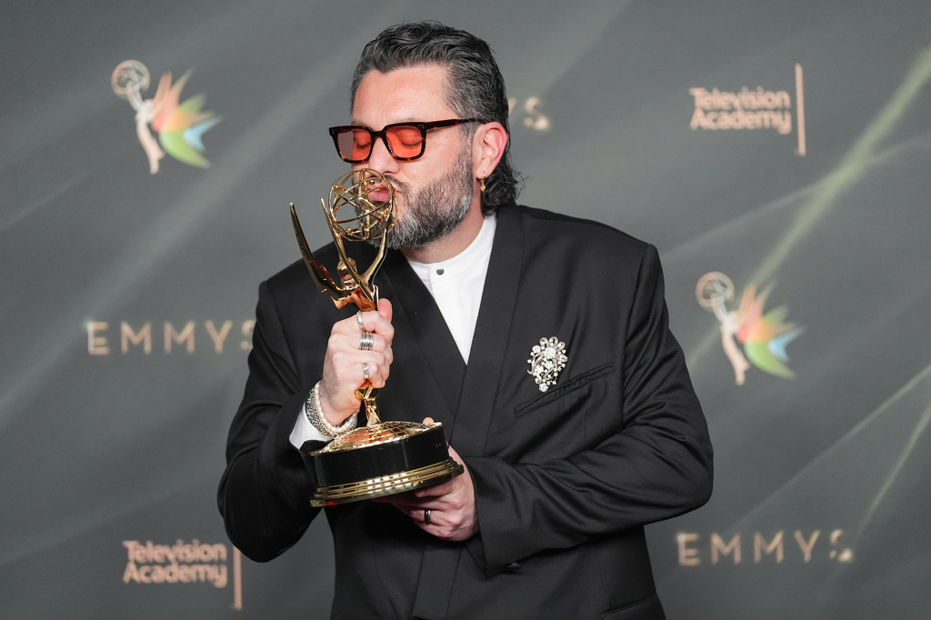 Miguel Gandelman poses in the press room with the award for outstanding music direction for "The Apple Music Super Bowl LX Halftime Show Starring Bad Bunny" during night one of the Creative Arts Emmy Awards on Saturday, Sept. 5, 2026, in Los Angeles. (AP Photo/Chris Pizzello)