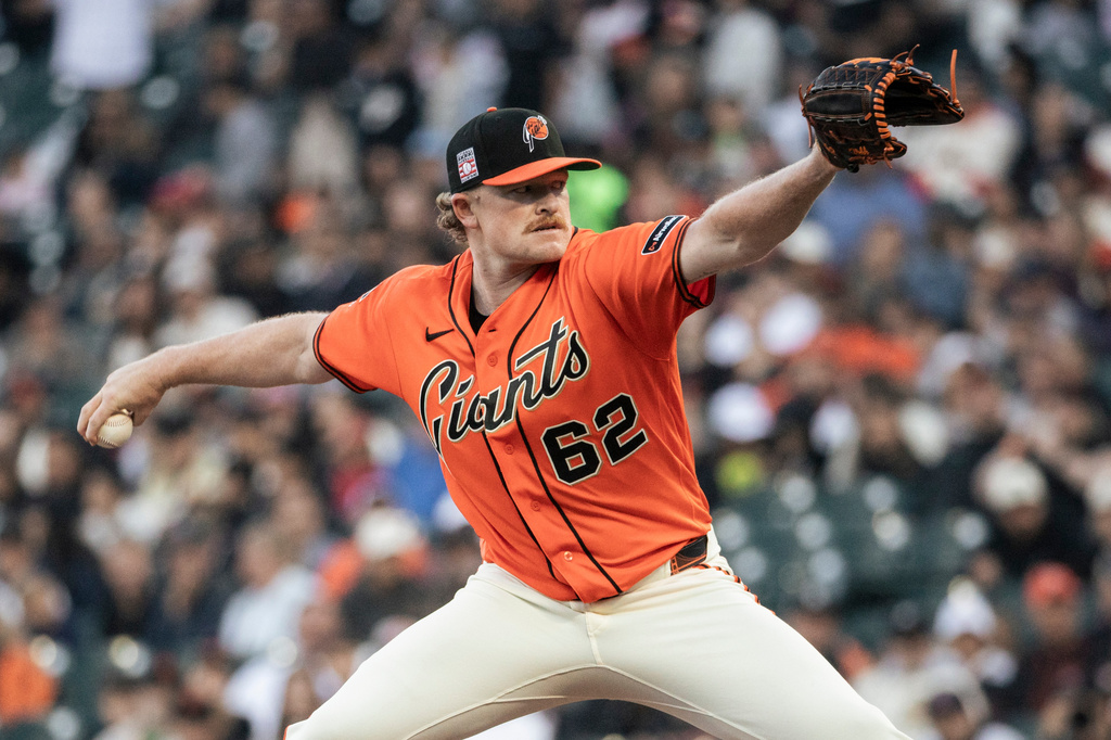 San Francisco Giants pitcher Logan Webb (62) delivers a pitch during the first inning of a MLB baseball game against the Los Angeles Angels in San Francisco, Friday, July 24, 2026. (Stephen Lam/San Francisco Chronicle via AP)
