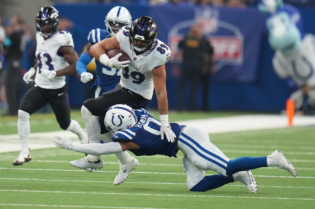 Baltimore Ravens' Mark Andrews tries to get past Indianapolis Colts' Cam Bynum during the second half of an NFL football game Sunday, Sept. 13, 2026, in Indianapolis. (AP Photo/Jeff Roberson)