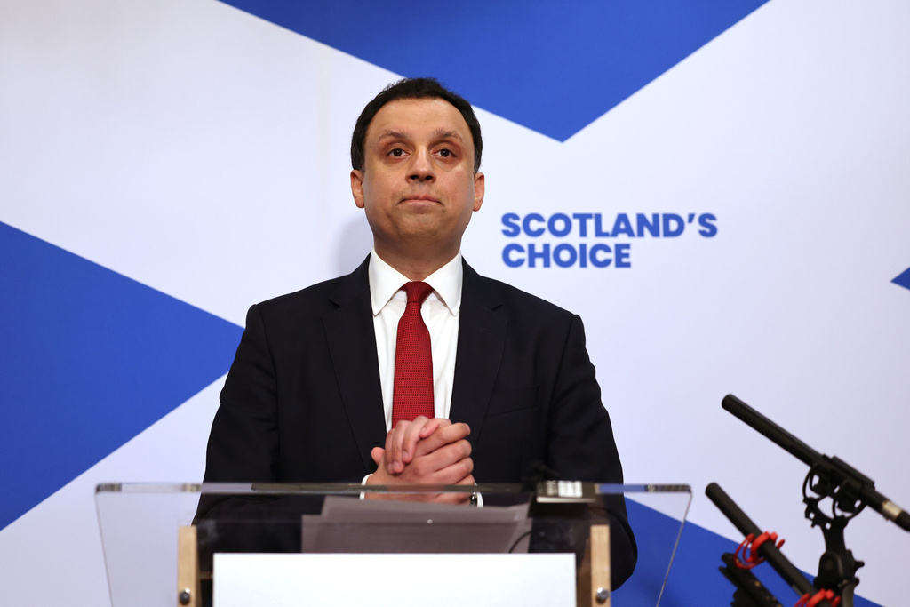 Scottish Labour leader Anas Sarwar speaks to the media during a press conference in Glasgow, Scotland, where he is calling on Keir Starmer to resign as Prime Minister, Monday Feb. 9, 2026. (Robert Perry/PA via AP)