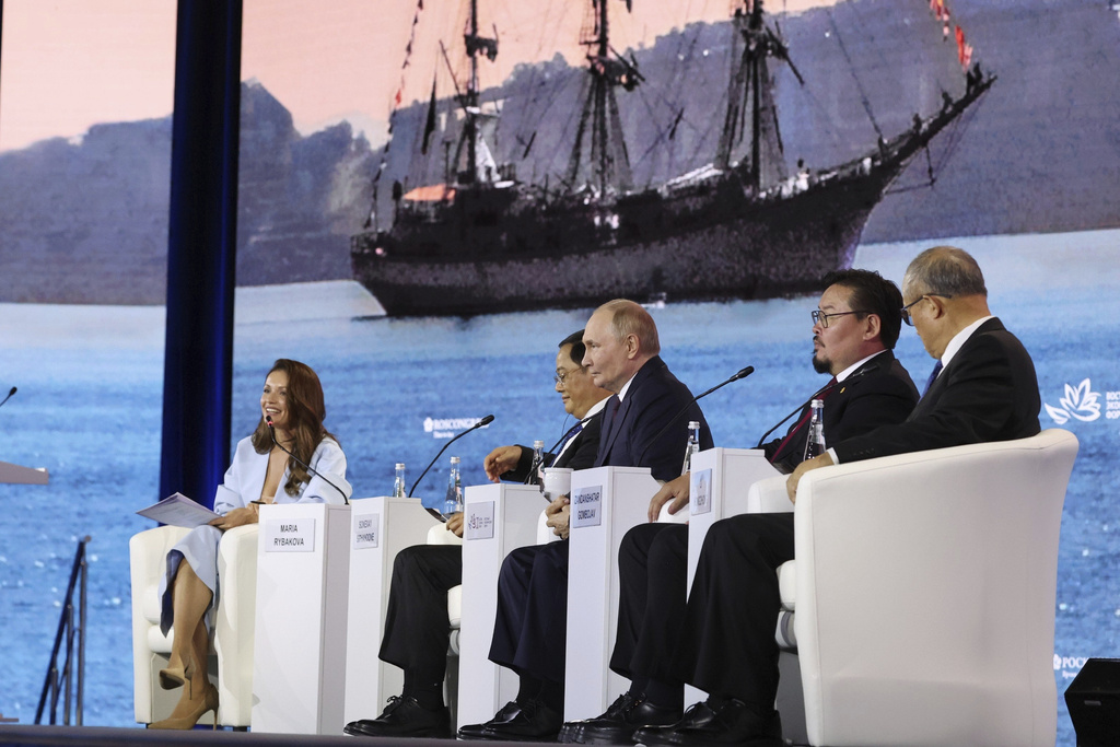 From left: TV anchor Maria Rybakova, Laotian Prime Minister Sonexay Siphandone, Russian President Vladimir Putin, Mongolian Prime Minister Gombojav Zandanshatar and China's Vice Chairman of the standing committee of the country's National People's Congress Li Hongzhong attend the plenary session of the Eastern Economic Forum in Vladivostok, Russia, Friday, Sept. 5, 2025. (Alexander Kazakov, Sputnik, Kremlin Pool Photo via AP)