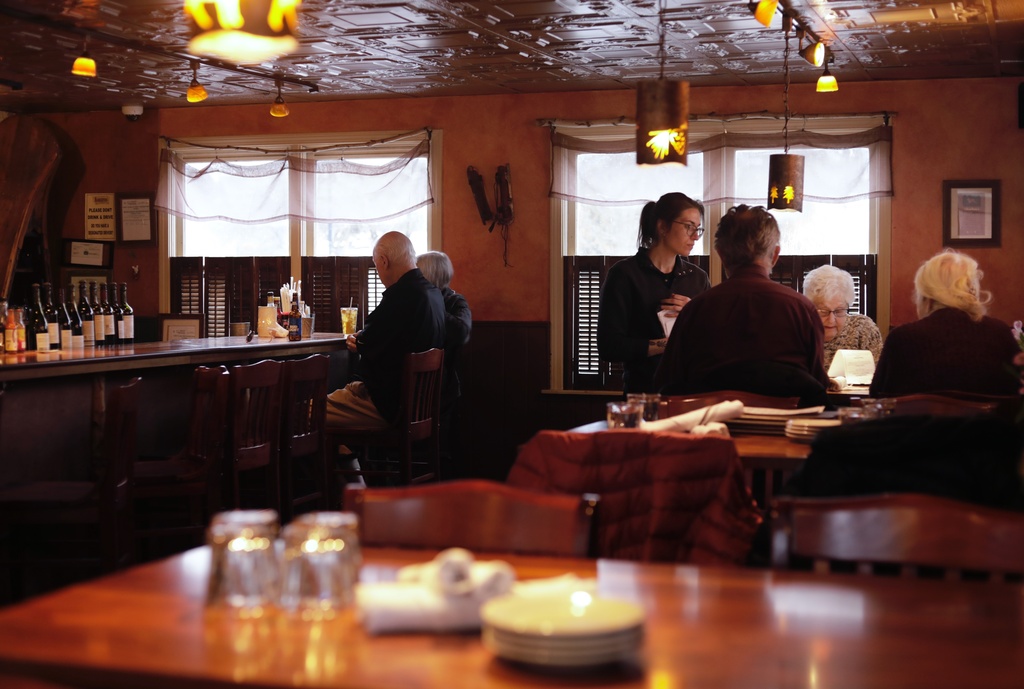 Diners eat at Barkeaters Restaurant on Tuesday, March 3, 2026 in Shelburne, Vt. (AP Photo/Amanda Swinhart)