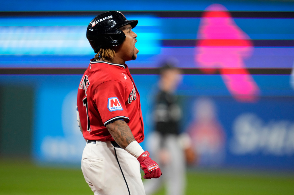 Cleveland Guardians third baseman Jos&eacute; Ram&iacute;rez celebrates after hitting a home run in the fourth inning of Game 5 of baseball's American League Division Series against the Chicago White Sox, Saturday, Oct. 10, 2026, in Cleveland. (AP Photo/Sue Ogrocki)