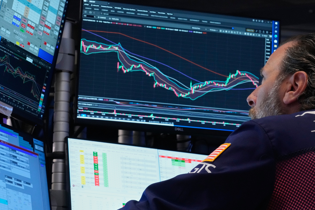 Specialist Michael Pistillo works on the floor of the New York Stock Exchange, Friday, June 26, 2026. (AP Photo/Richard Drew)