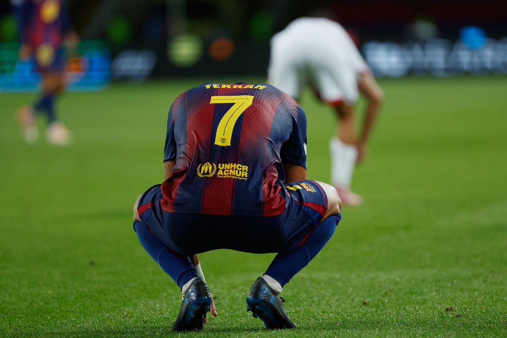 Barcelona's Ferran Torres, reacts at the end of the Champions League opening phase soccer match between Barcelona and Paris Saint-Germain at the Lluis Companys Olympic Stadium in Barcelona, Spain, Wednesday, Oct. 1, 2025. (AP Photo/Joan Monfort)