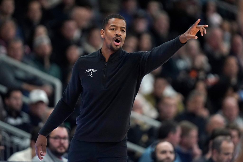 FILE - Providence coach Kim English shouts from the sideline during the second half of the team's NCAA college basketball game against Marquette, Tuesday, Dec. 19, 2023, in Providence, R.I. (AP Photo/Steven Senne, File)