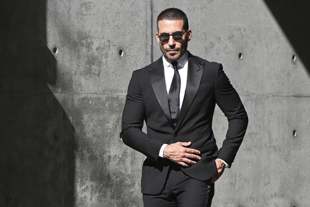 Spanish actor Miguel Angel Silvestre leaves the Armani/Teatro in Milan, northern Italy, after paying his respects to designer Giorgio Armani, who died in Milan on Thursday at age 91. Saturday, Sept. 6, 2025.(AP Photo/Nicola Marfisi)
