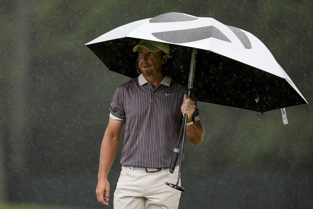 Tommy Fleetwood, of England, walks off the second green during the third round of the Tour Championship golf tournament, Saturday, Aug. 23, 2025, in Atlanta. (AP Photo/Mike Stewart)