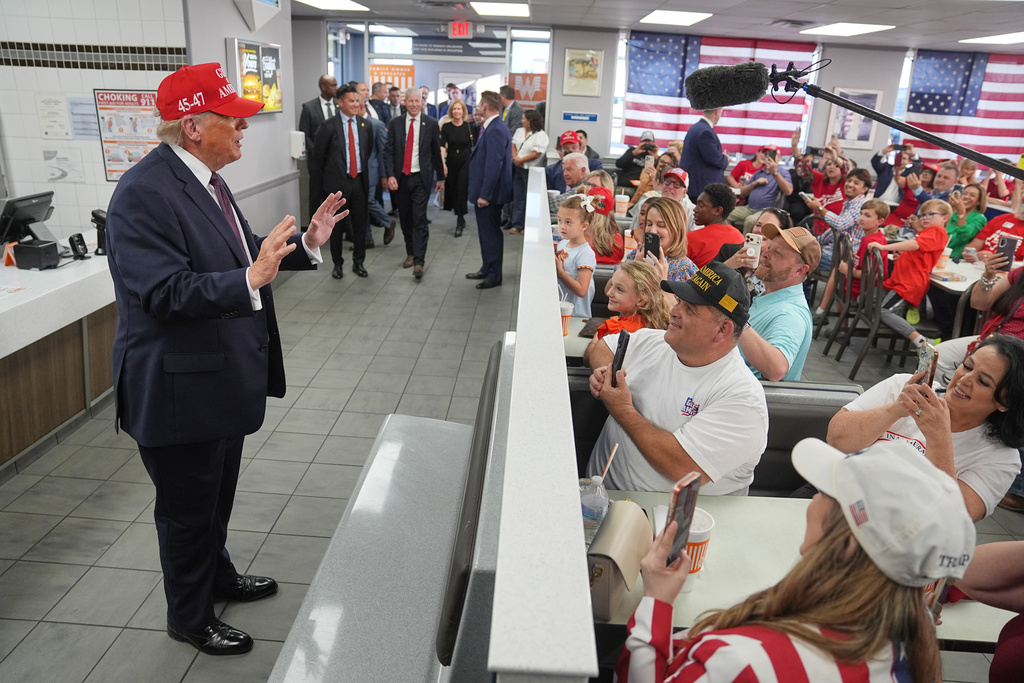 President Donald Trump visits a Whataburger restaurant in Corpus Christi, Texas, Friday, Feb. 27, 2026. (AP Photo/Matt Rourke)