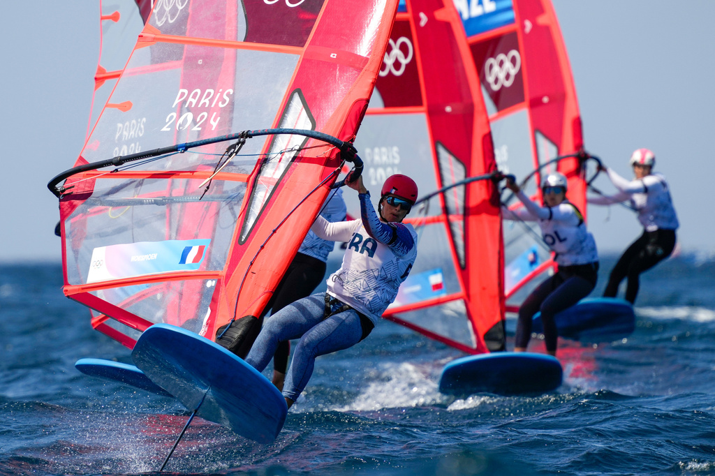 FILE - Helene Noesmoen, of France, leads a pack while competing in a women's iQFOiL windsurfing class quarterfinal race during the 2024 Summer Olympics, Aug. 3, 2024, in Marseille, France. (AP Photo/Carolyn Kaster, File)