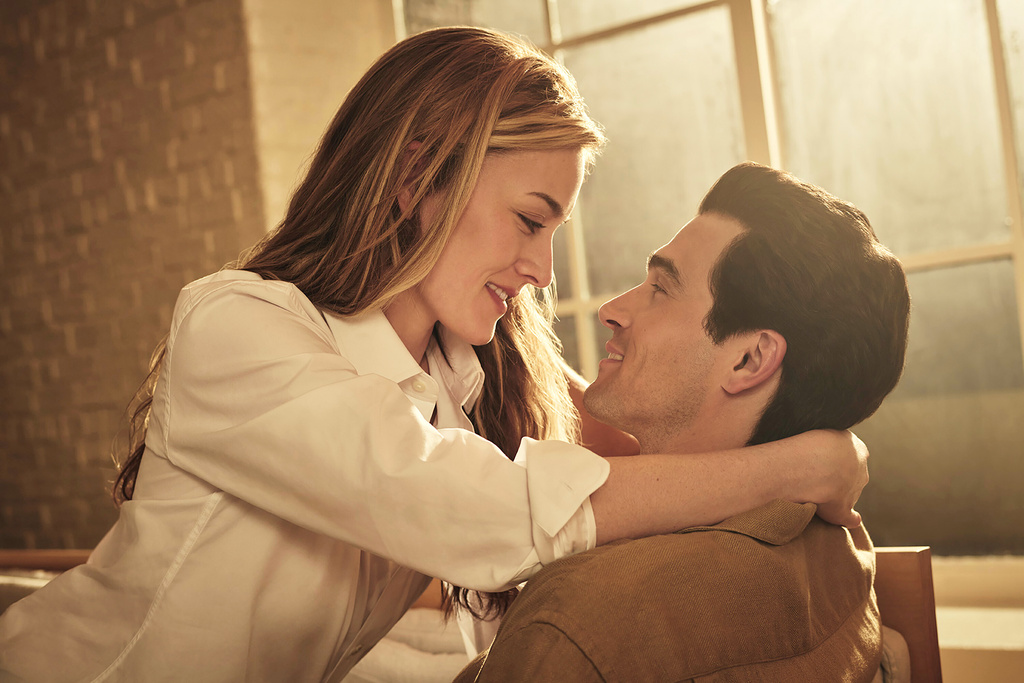 This image released by FX shows Sarah Pidgeon as Carolyn Bessette Kennedy, left, and Paul Kelly as John F. Kennedy Jr. in a scene from "Love Story: John F. Kennedy Jr. & Carolyn Bessette." (FX via AP)