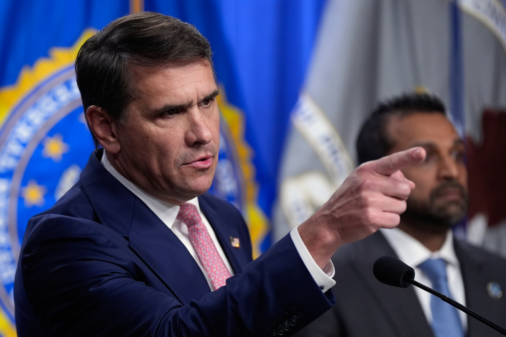 Acting Attorney General Todd Blanche speaks as FBI director Kash Patel speaks during a news conference at the Department of Justice, Wednesday, July 1, 2026 in Washington. (AP Photo/Manuel Balce Ceneta)