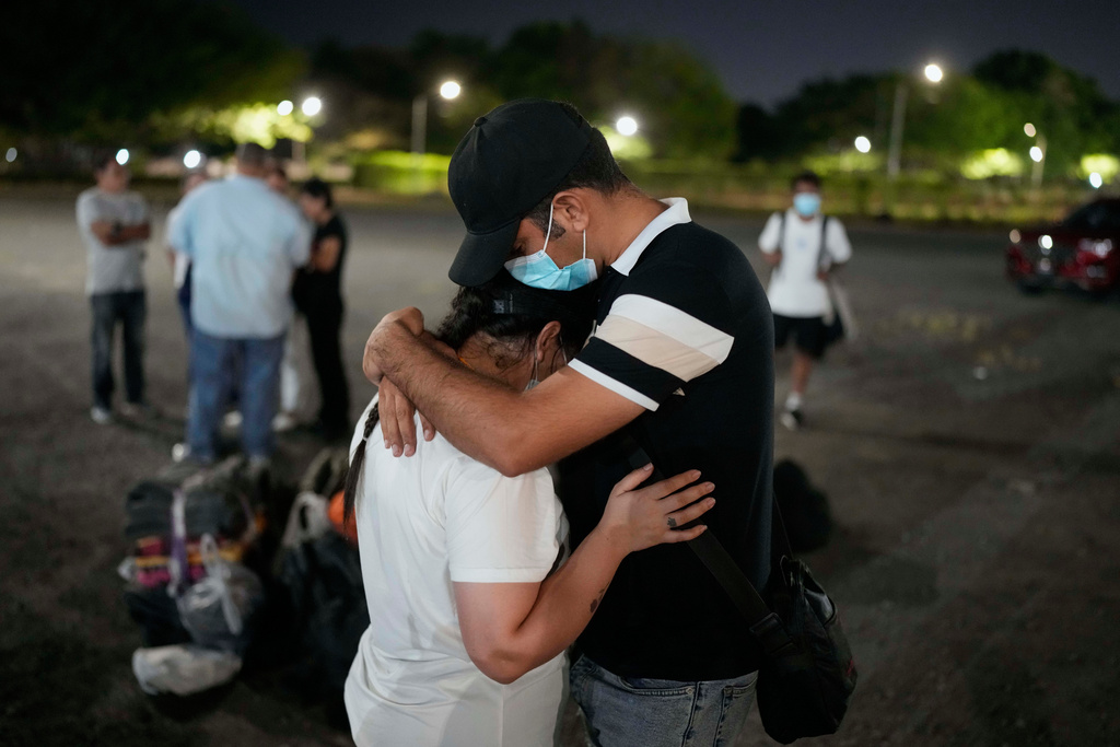 FILE - Asylum seekers embrace upon arriving in Panama City, March 8, 2025. (AP Photo/Matias Delacroix, File)