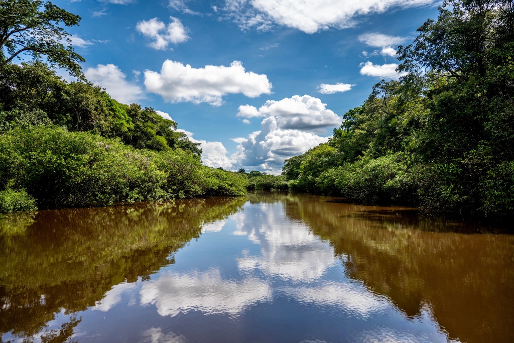 Clouds are reflected in the Tahuayo River, a tributary of the Amazon River, near the city of Iquitos, Peru on Sept. 26, 2025. (AP Photo/Junior Raborg)