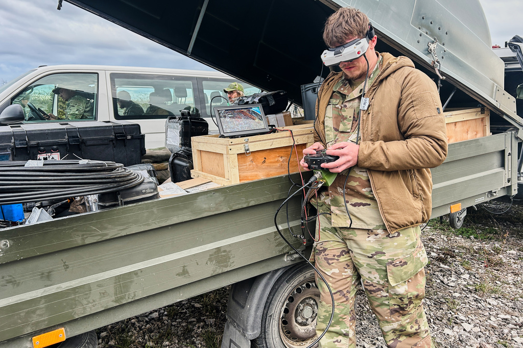 A Ukrainian drone pilot, who uses the call-sign Tarik in line with Ukrainian military regulations, flies a FPV drone during a military exercises in Gotland, Sweden, Sunday, May 10, 2026. ADDITION: adds info that Tarik is the call-sign name (AP Photo/Emma Burrows)