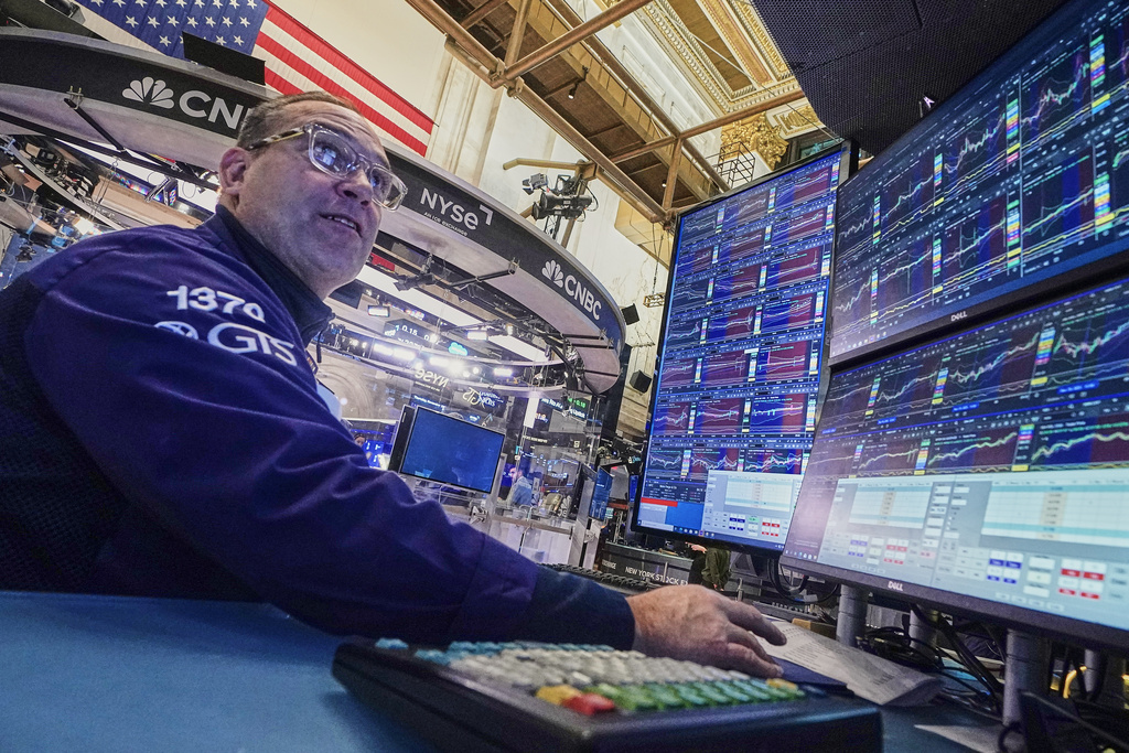 Specialist Anthony Matesic works on the floor of the New York Stock Exchange, Thursday, Nov. 20, 2025. (AP Photo/Richard Drew)